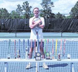 Gunner Long has developed his tennis game by competing in Level 5 and Level 6 USTA tournaments in Florida and Georgia, winning several events over the years.