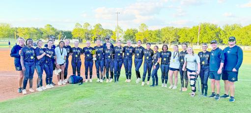 Members of the 2026 Region 1-5A Lady Jacket championship team include, from left, coach Summer Frye, Bella Ellis, Hardie Purcell, Jaelyn Hall, coach Charlie Lyons, Bella Hannah, Emery Aspinwall, Ada Sluder, Morgan Boatright, Ellie Harrison, Emme Richardson, coach Tyler Rogers, Kallie Scott, Addison Thompson, Chaelen Gilleon, Brooklyn Wood, Emma Mallard, Makayla Trice, Allie Ward, Eda Anderson, Olivia Eubanks, Marlee Walling, coach Chase Hinson and coach Chase Bryant.