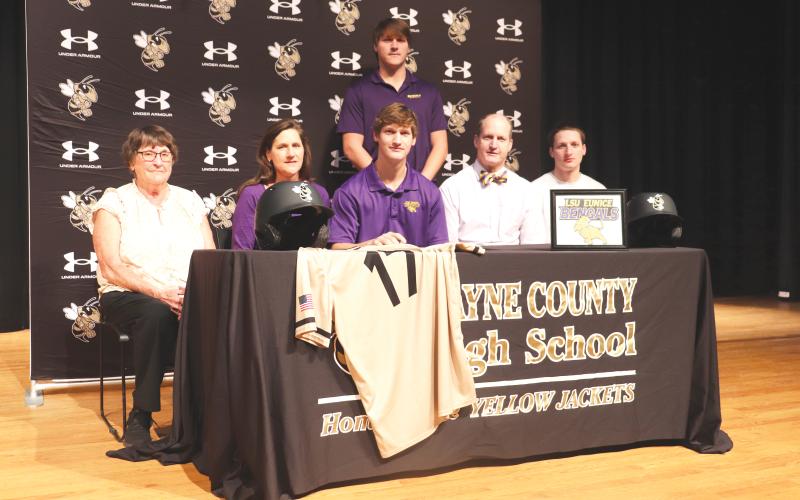 ERIC DENTY / Staff Jacket baseball player Nicholas Thomas signed last week to play baseball at LSU-Eunice in Eunice, Louisiana. He is joined by, from left, Tina Tillman, Sabrina Thomas, Dr. Eddie Thomas and Ben Thomas. In back is his brother, Zach Thomas.