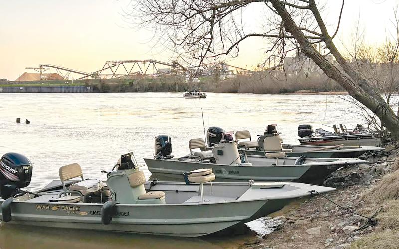 DAN SCOTT / Special Boats from the Department of Natural Resources and several counties scan the river as part of the search-and-rescue operation on the Altamaha River last Sunday and Monday.