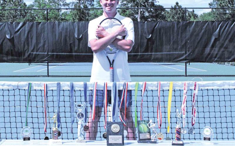 Gunner Long has developed his tennis game by competing in Level 5 and Level 6 USTA tournaments in Florida and Georgia, winning several events over the years.