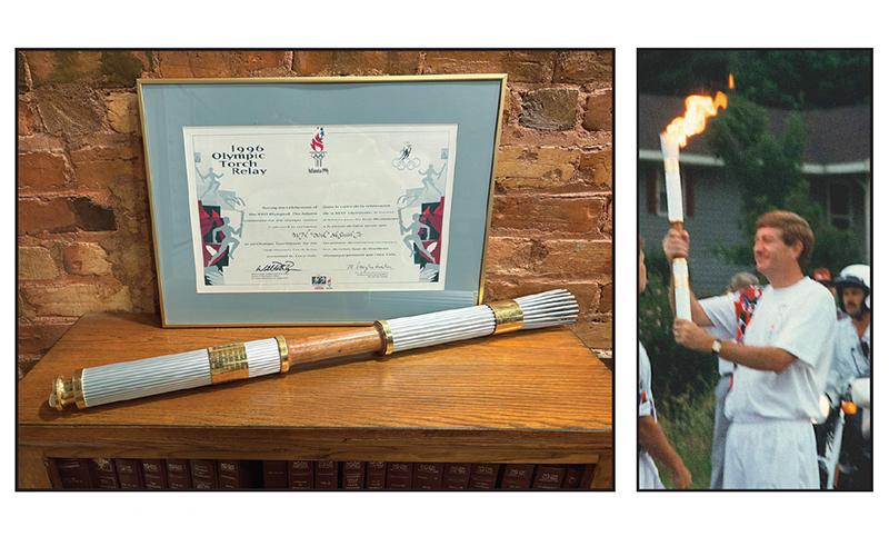 Atop an oak bookcase in my office sits the Olympic torch that I carried in 1996. An added memory was that our son Eric trotted along beside me. Associate Johnny Solesbee took the photo at right before I began my run in Stephens County.