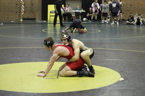 Mark Ogden wrestled three times and picked up a win against Bacon High