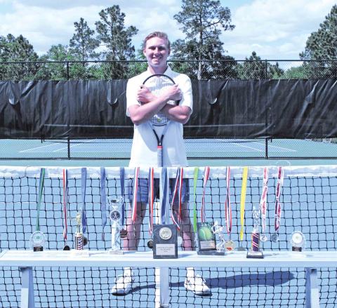 Gunner Long has developed his tennis game by competing in Level 5 and Level 6 USTA tournaments in Florida and Georgia, winning several events over the years.