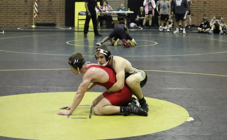 Mark Ogden wrestled three times and picked up a win against Bacon High