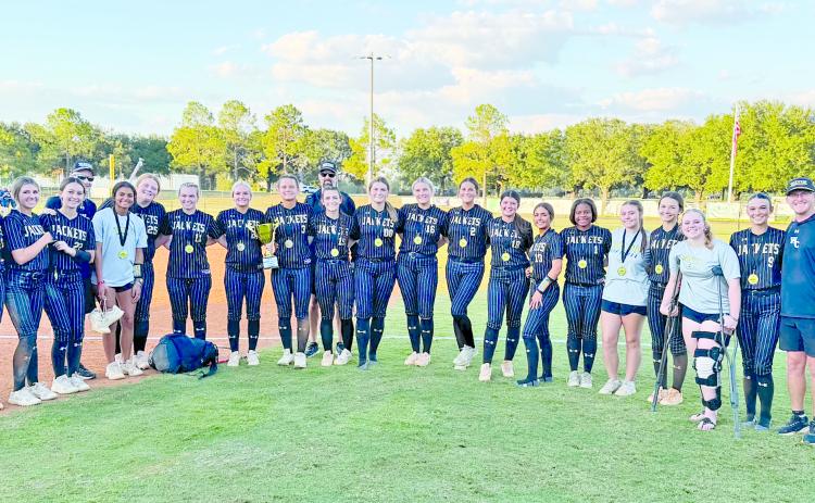 Members of the 2026 Region 1-5A Lady Jacket championship team include, from left, coach Summer Frye, Bella Ellis, Hardie Purcell, Jaelyn Hall, coach Charlie Lyons, Bella Hannah, Emery Aspinwall, Ada Sluder, Morgan Boatright, Ellie Harrison, Emme Richardson, coach Tyler Rogers, Kallie Scott, Addison Thompson, Chaelen Gilleon, Brooklyn Wood, Emma Mallard, Makayla Trice, Allie Ward, Eda Anderson, Olivia Eubanks, Marlee Walling, coach Chase Hinson and coach Chase Bryant.