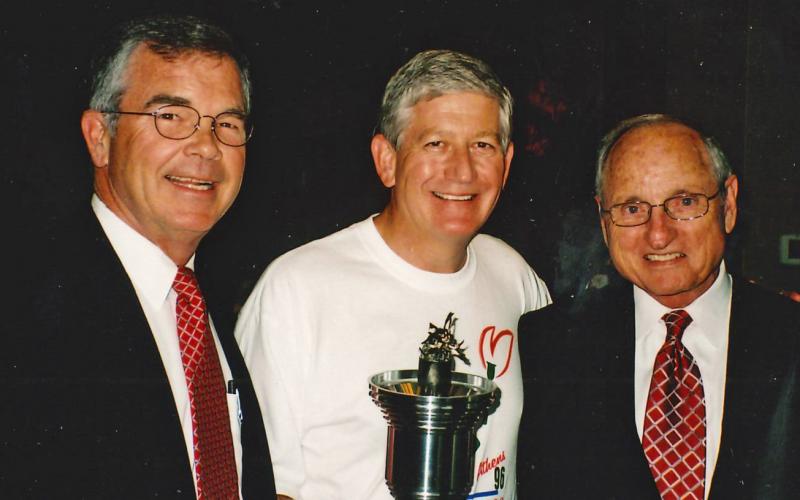 Billy Payne, left, Dink NeSmith, center, and former UGA football coach and athletic director Vince Dooley, right.